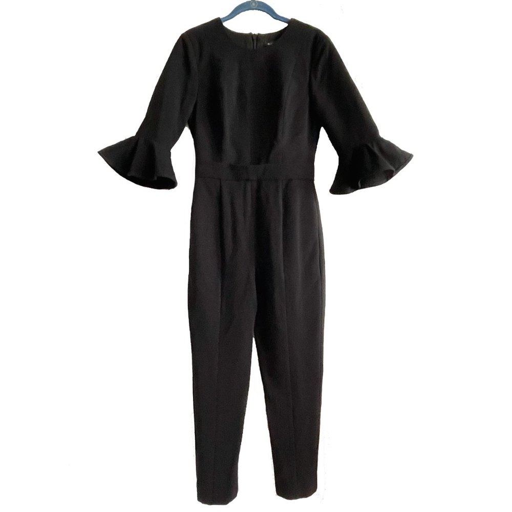Black Halo women's jumpsuit with ruffle on sleeves. Black. New NWT. Size 6